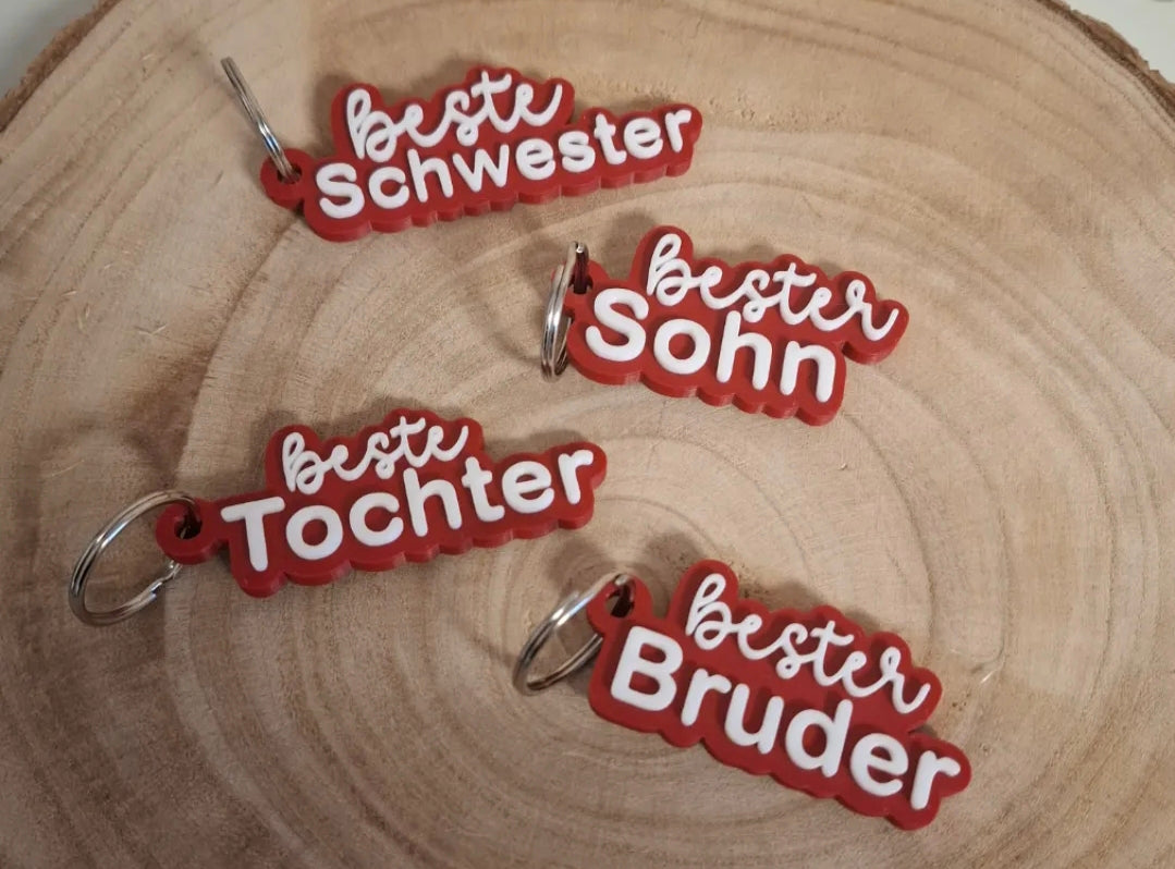 "Familien Schlüsselanhänger 3D-Druck in verschiedenen Farben und Varianten"