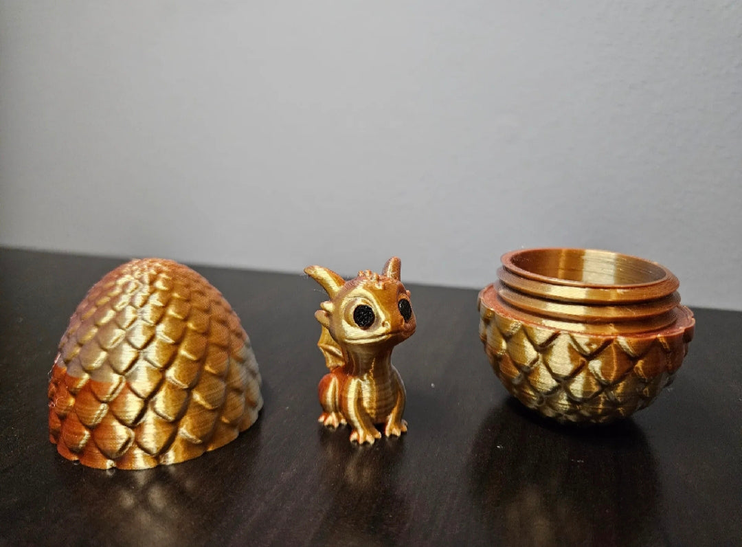 "3D-gedrucktes Überraschungs-Ei mit süßem Babydrachen in bunten Farben"